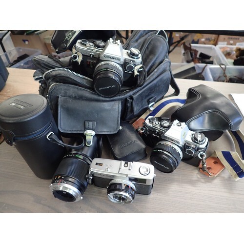 3 Retro Olympus Cameras with cases Ect.