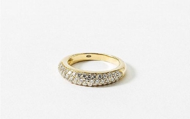 An 18 carat gold and diamond band ring