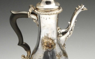 An early George III silver coffee pot.