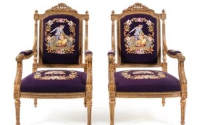 A Pair of Louis XVI Style Fauteuils Height 44 inches.