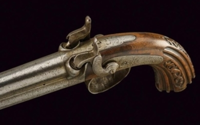 A OVER AND UNDER BARRELED PERCUSSION PISTOL