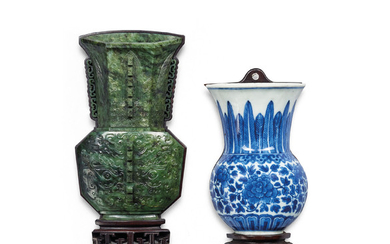 A SPINACH-GREEN JADE ARCHAISTIC WALL VASE AND A BLUE AND WHITE ‘PEONY’ WALL VASE, QING DYNASTY, 19TH CENTURY