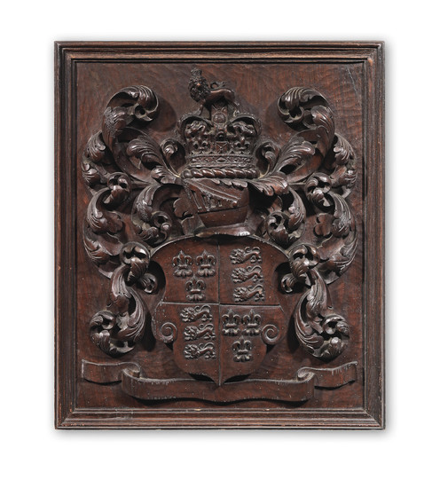 A 19th century carved walnut coat of arms