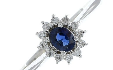 A 9ct gold sapphire and diamond cluster ring.