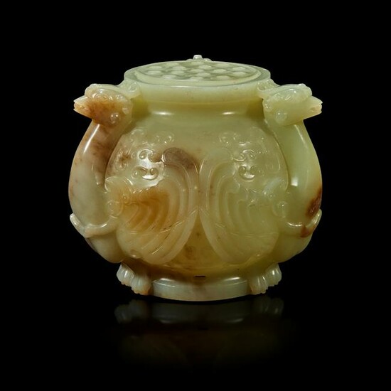 A Chinese carved celadon and jade vessel