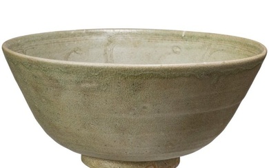A Chinese incised celadon-glazed bowl, probably southern Song Dynasty (1127 - 1368)