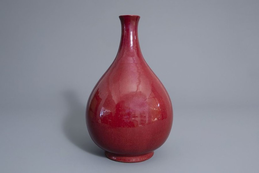 A Chinese monochrome sang de boeuf bottle vase,...