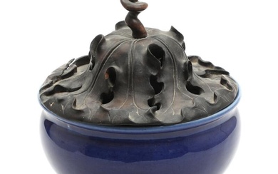 A Chinese powder blue porcelain tripod censer, wooden cover carved as leaves....