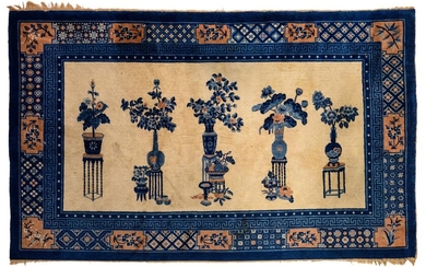 A Chinese rug, decorated with flower vases, 170 x 274 cm