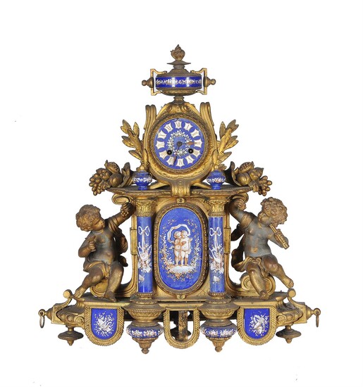 A French gilt metal and blue ceramic mounted mantel clock