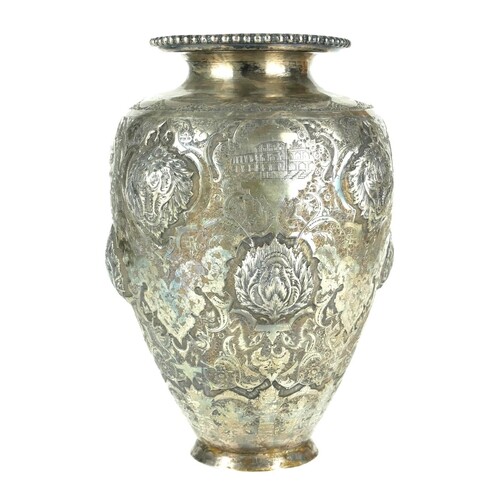 A GOOD 19TH CENTURY PERSIAN SILVER BALUSTER VASE Embossed in...