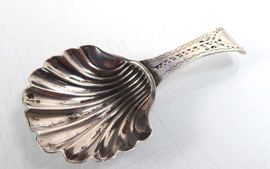 A George III silver caddy spoon with shell bowl, Peter...