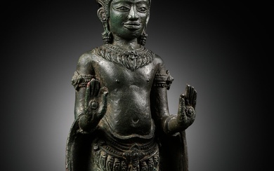 A KHMER BRONZE FIGURE OF BUDDHA SHAKYAMUNI, LOPBURI STYLE, 13TH CENTURY