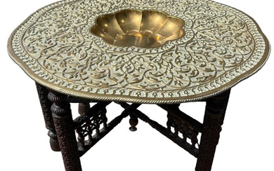 A LARGE DECORATIVE EARLY 20TH CENTURY INDIAN BRASS TRAY...