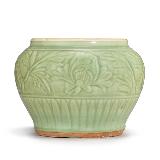 A Longquan celadon 'peony' jar, Yuan dynasty 元 龍泉青釉刻牡丹紋罐