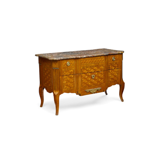 A Louis XV/XVI Transitional Style Gilt Metal Mounted and Parquetry Inlaid Kingwood Commode