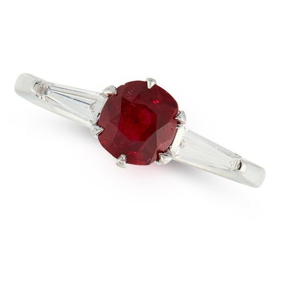 A RUBY AND DIAMOND RING set with a cushion cut ruby of