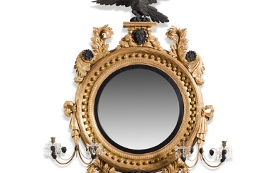 A Regency-style giltwood and ebonised convex mirror