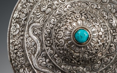 A TURQUOISE-INLAID SILVER REPOUSSÉ BETEL NUT BOX AND COVER, BHUTAN, EARLY 19TH CENTURY