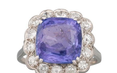 A VINTAGE SAPPHIRE AND DIAMOND CLUSTER RING, the cushion cut...