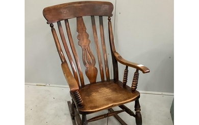 A Victorian elm and beech Windsor lathe back rocking chair, ...