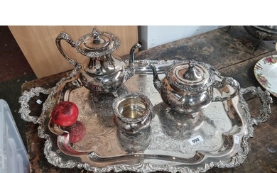 A Victorian-style silver-plated tea service, includes teapot...