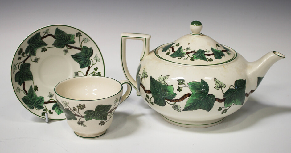 A Wedgwood Napoleon Ivy pattern part service, including a teapot and cover, cups and saucers, tea pl