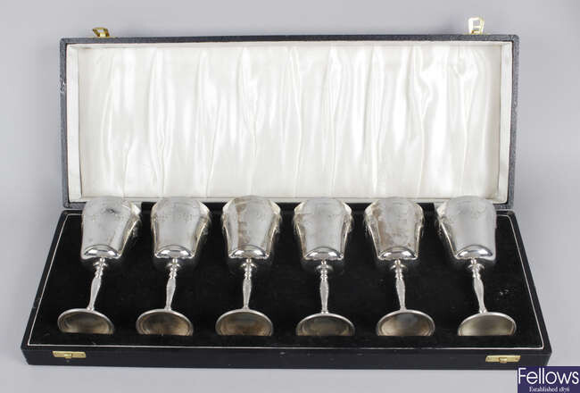 A cased set of six mid-20th century silver goblets.