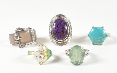 A collection of 925 silver, gem set and enamel rings. The ri...