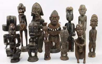 A collection of eleven tribal carved hardwood figures, 20th century, comprising a...