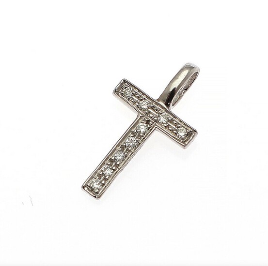 A diamond pendant in the shape of the letter “T” set with numerous brilliant-cut diamonds, mounted in 14k white gold. W. 1.3 cm. H. incl. eye-let 2 cm.
