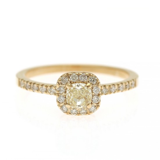 A diamond ring set with a cushion-cut diamond, app. 0.40 ct., and numerous brilliant-cut diamonds, mounted in 14k gold. Size 53.