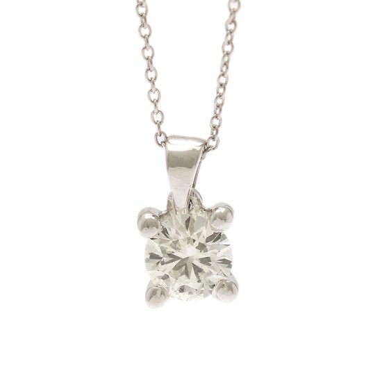 A diamond solitaire pendant set with a brilliant-cut diamond weighing app. 0.45 ct., mounted in 14k white gold. Accompanied by necklace of 14k white gold.