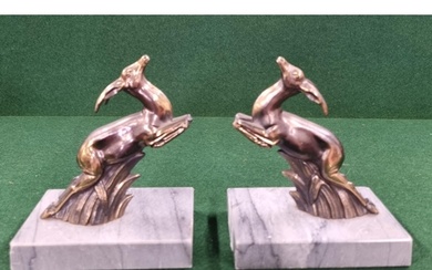 A good pair of mid 20th Century Bookends with bronze leaping...