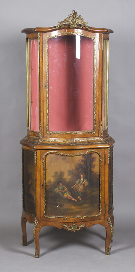 A late 19th/early 20th century French Louis XV style kingwood and gilt metal mounted vitrine, the ca
