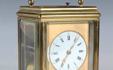 A mid to late 19th century lacquered brass grande sonnerie carriage alarm clock with eight day movem