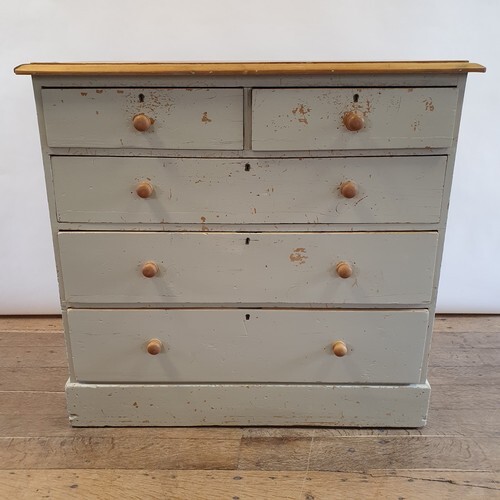 A painted pine chest, having two short and three long drawer...