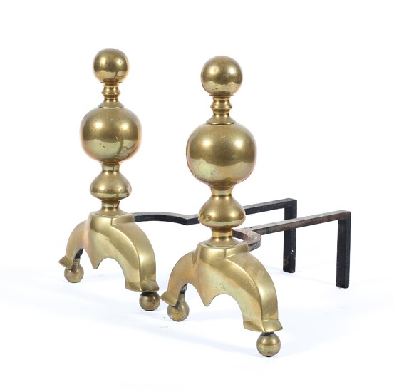 A pair of 19th century brass and iron fire dogs