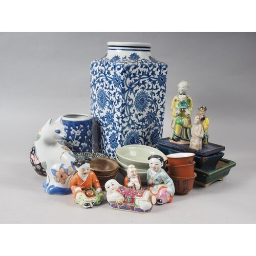 A quantity of mostly Chinese figures, a blue and white brush...