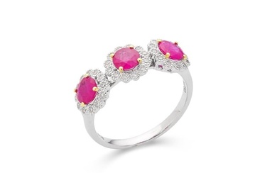 A ruby and diamond triple-cluster ring