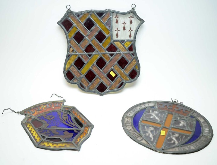 A selection of three armorial plaques.
