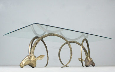 ALAIN CHERVET. Attributed. Coffee table/Coffee table with brass ibex heads, France, 1970s.