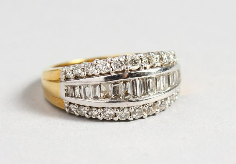 AN 18CT GOLD AND DIAMOND BAGUETTE RING.