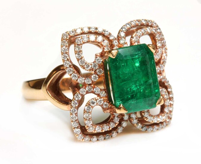 An 18ct rose gold emerald and diamond quatrefoil-shaped cluster ring