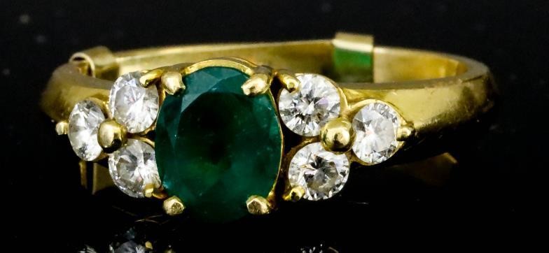 An Emerald and Diamond Ring, Modern, in 18ct gold...