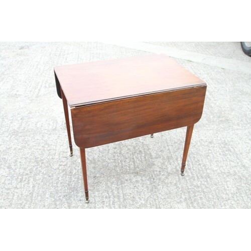 An early 19th century mahogany Pembroke table, fitted one dr...