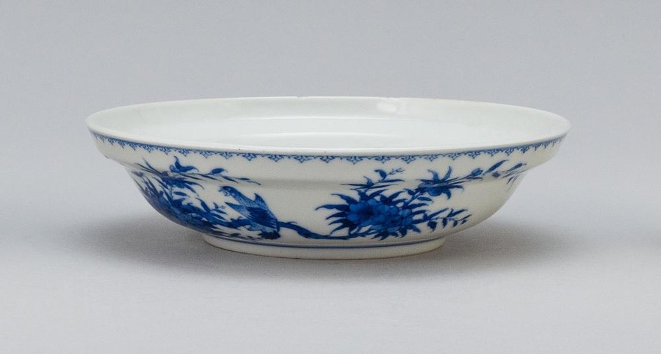 CHINESE BLUE AND WHITE PORCELAIN BOWL Decoration of a bird on a flowering tree branch. Six-character Guangxu mark on base. Height 1....
