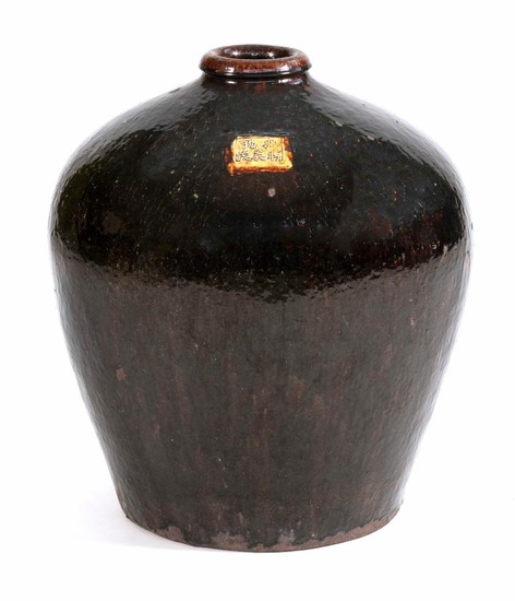 CHINESE BROWN GLAZE POTTERY JAR In ovoid form. Beige five-character mark at shoulder. Height 30".