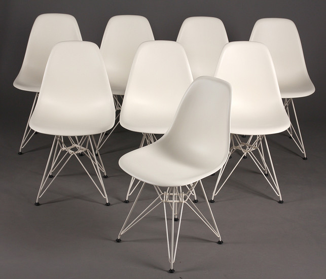 Charles Eames. A set of eight shell chairs with coloured shells in white plastic, model DSR (8)