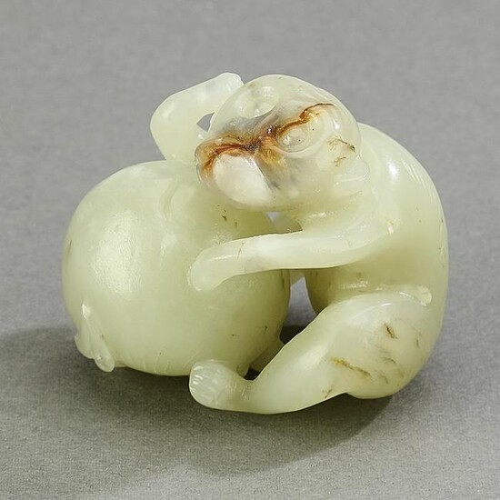 Chinese jade carving of a monkey and peach